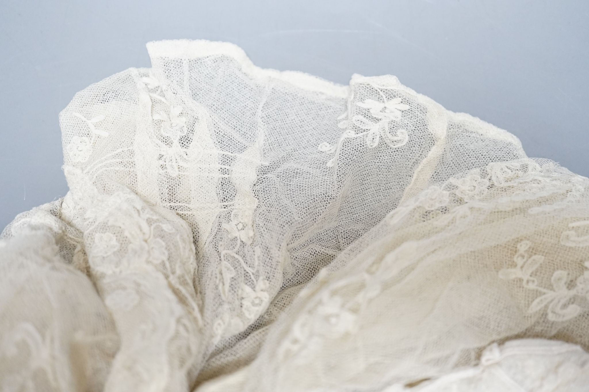 Three Edwardian lace blouses, a lace collar and all-in-one under garments